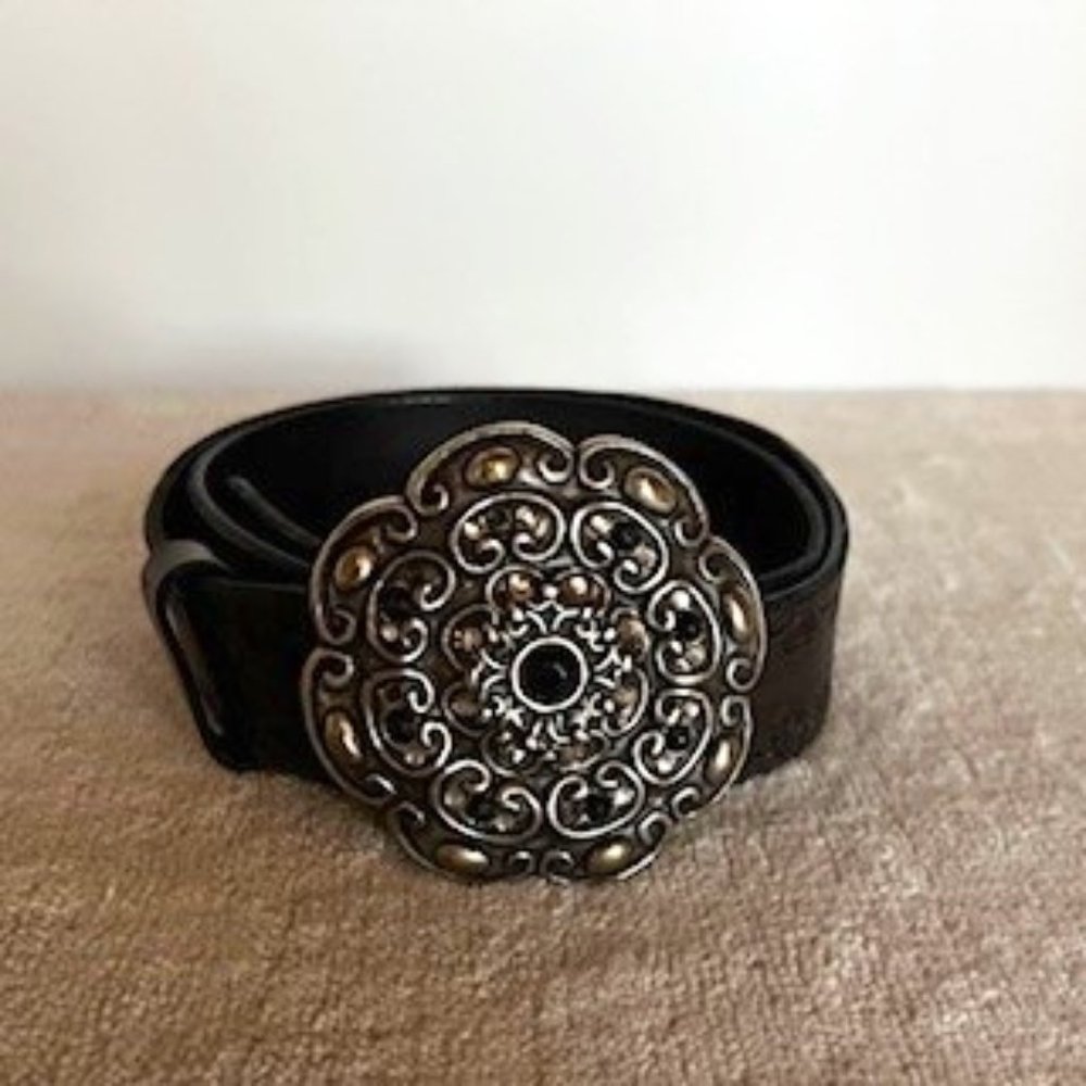 Black leather belt with distressed metal buckle.